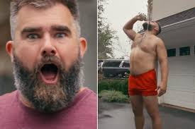 Shirtless Jason Kelce Washes Cybertruck, Pees in Bush for Garage Beer  Commercial
