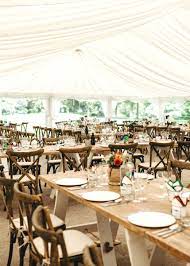 Cross Back Chairs And Rustic Wooden Trestle Tables Perfect For A Wedding Marquee Wooden Trestle Table Marquee Wedding Devon And Cornwall