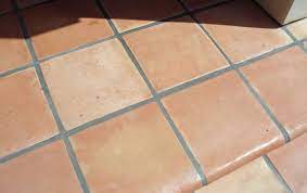 The saltillo tile floor in this cozy and practical patio for two. Saltillo Tile Outdoor Deck Bourget Bros