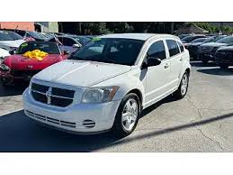 Image result for Bright Silver 2009 Caliber