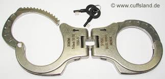 Kate is led in handcuffs onto the plane. Products From Germany
