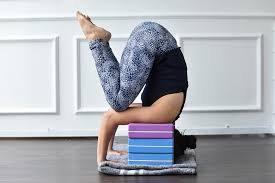 Lift up your torso and sit on your heels. Prop Up The Best Support To Headstand Ha My Yoga Malmo Sweden