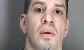 New York man 'walked up to stranger in a supermarket and slit his throat'