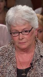 Becky claims Kay took their grandson out of grade school. Kay says he has  asthma and is taking classes online.