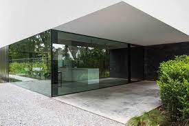 icoon be architecten open plan raw concrete split level loft house solid surface minimal kitchen furniture origami folded white roof n haus architektur fenster