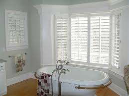 If your bathroom windows are small, there are many creative ways to give them a stylish looking window treatment a fun idea for decorating a small bathroom window is applying a shutter to it. Plantation Shutters Custom Window Treatments In Greenwich Ct