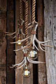 10 Functional And Stylish Things You Can Make With Shed Antlers Antler Lights Antler Light Fixtures Antlers Decor
