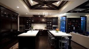 The dark gray with white countertops is perfect for anyone looking to have a simple, clean look for their kitchen. 22 Beautiful Kitchen Colors With Dark Cabinets Home Design Lover