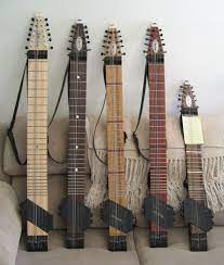 The Chapman Stick Coolest Instrument Ever No Strumming Or Picking Needed And You Play All The Melody With B Chapman Stick Custom Bass Guitar Music Guitar