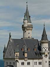 The lavish structure is complete with a walled courtyard, an indoor garden, spires, towers, and an artificial cave. Neuschwanstein Castle Wikipedia