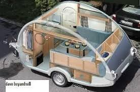 The basic kit includes everything from the basic wooden frames and steel beams to lexan window, roof vent, doors, and other items needed to build your own teardrop camper. Build Your Own Teardrop Trailer Small Caravan Tiny Little Plans Teardrop Camper Teardrop Trailer Interior Teardrop Camper Trailer