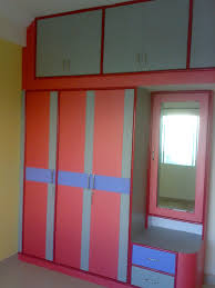 A crate placed vertically at the side of the bed. Bed Modern Small Bedroom Cupboard Designs Novocom Top