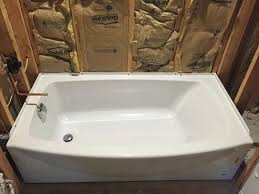 With brass faucets, mauve and teal walls, wallpaper and colored toilets, the hallmarks of a 1980s bathroom really date a home. American Standard Ovation 60 In Right Drain Bathtub In Arctic White 2647 112 011 The Home Depot American Standard Restroom Remodel Tub