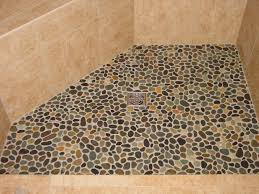 River Rock Wall These Are Rounded River Rocks Look Closely At The Edges Of The Floor Shower Floor Shower Tile Pebble Shower Floor