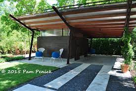 Geometric Design Creates Modern Garden For Entertaining Digging Carport Designs Modern Carport Modern Garden
