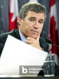 Image of CONSERVATIVE DAVID ORCHARD READS FROM AGREEMENT WITH PARTY LEADER,  2003