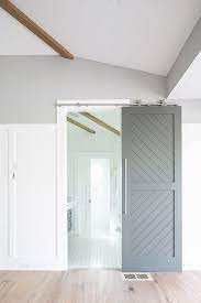 The luxury finishes of sherwin williams pewter green on the cabinets with mixed black and gold metals meet fun and preppy plaid and herringbone tile. Custom Made Cypress Chevron Farmhouse Sliding Barn Door Etsy