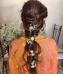 You worked hard to get there, so you have every right to stand out — with or without a flower crown. 50 Trending Indian Bridal Hairstyles For Haldi Mehndi