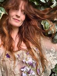 Throwback photo of Florence and Isa standing in front of Bob Dylan's tour  bus in Rick Rubin's yard 🚌 📸: @isamachine