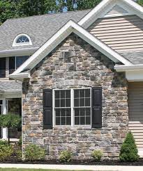 Should i paint the trim around to match the door? Siding Trim Exteriors Unlimited Inc Stone Exterior Houses Stone Siding Exterior Brick Siding