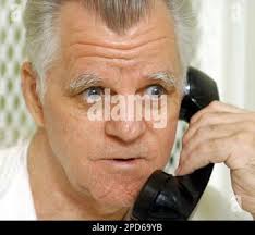 File photo taken Sept. 6, 1990, shows South Korean President Roh Tae Woo  (L) shaking hands with North Korean Prime Minister Yon Hyong Muk in Seoul.  Roh died