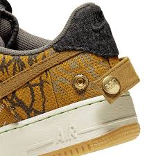 This nike air force 1 low features a brown leather and suede upper highlighted with yellow x stitching along the seams, along with pink swoosh logos. End Features Nike X Travis Scott Air Force 1 Register Now On End Launches