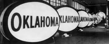 New Oklahoma Signs (Subsidiary of Standard Oil Company of New Jersey)  getting new plastic signs ready after buying Gaseteria.