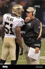 2009 September 13: New Orleans Saints defensive coordinator Gregg Williams talks to linebacker Jonathan Vilma (51) during a 45-27 win by the New Orleans Saints over the Detroit Lions at the Louisiana