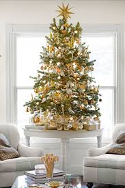 Upgrade Your Christmas Tree Game With These Decorating Ideas Tabletop Christmas Tree Beautiful Christmas Small Christmas Trees