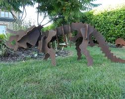Dinosaur art steel sculpture skeletons public art dinosaurs larry sculpting paleo creatures. Metal 3d Dinosaur Sculpture Rusty Metal Plesiosaurus Etsy Rusty Metal Garden Art Garden Centerpiece Metal Garden Art