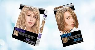 The lower layers of hair are highlighted in peekaboo highlights. Your Guide To Using Cap Highlights On Your Hair L Oreal Paris