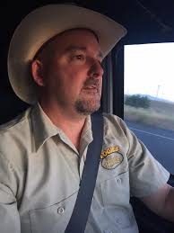 Just borrowing the cowboy band . But who"s the man at front with the old  bag ???