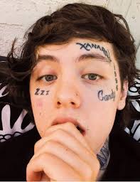 Top 10 Famous Rappers With Face Tattoos - Tattoo Me Now
