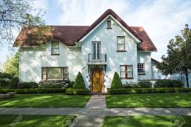 Red tile roof white stucco houzz is one images from white stucco homes ideas of the inductive photos gallery. White American Craftsman Stucco House With A Red Roof Stock Photo Picture And Royalty Free Image Image 19326253