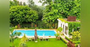 A natural pool setting creates a oasis in the midst of a busy neighborhood. List Of Best Pool Party Places In Delhi Lbb Delhi