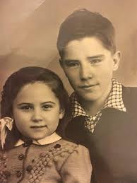 Lulu Brown (1883-1969), Genevieve "Jen" Shultz Davenport (1883-1971), and  Genevieve Brown (1889-1962). The photo was taken in Nell Bumgarner's living  room; these three women grew up together & were lifelong friends. Jen
