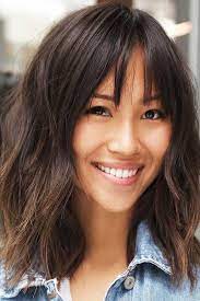 Wispy Bangs Are A Trendy Way To Freshen Up Your Casual Hairstyle Medium Short Hair Medium Length Hair Styles Hairstyles With Bangs