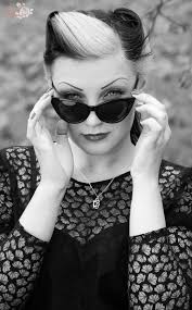 Hd00:46dissapointed girl with long blonde hair in leather jacket straightens hair use gadget sitting on the bench in the wind listen. Want These Psychobilly Glasses Rockabilly Hair Retro Hairstyles Blonde Streaks