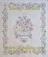 This is beautiful in all the same colors with the blocks twisted or in all different colors and the blocks all facing the same way. Tkq Marian S Floral Bouquet Wall Quilt Printed Pattern 22x26