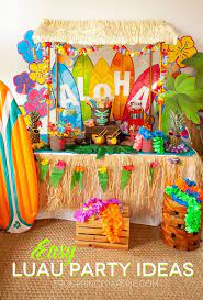 Use reed fencing to create the front of your tiki bar and secure it in place with a staple gun. Easy Luau Party Ideas And Tiki Bar Set Up Frog Prince Paperie