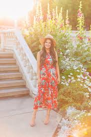 I love pairing a denim jacket with a floral print to give it a casual edge. What To Wear To A Garden Party Justinecelina