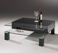 Traditional wood coffee table is the perfect piece to anchor your living space Buy A Black Glass Coffee Table In Modern Design Dreieck Design