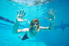 A photo of him as an infant — submerged in water and seemingly chasing a dollar bill dangling from a fish hook — became the cover of nirvana's 1991 release nevermind, considered one of. Vt J4rmtzlfjem