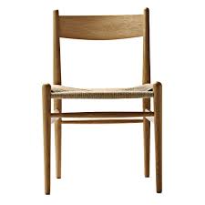 Puis tout à coup, en retournant la main, la chaise apparaît. Chaise Ch36 De Carl Hansen Connox