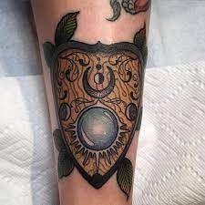 15 Spiritual Planchette Tattoos Zeichnungen