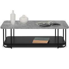 Création originale, dont le piètement cerclant le plateau renforce l'impression de lévitation de ce dernier.un bel effet de perspective est créé par la symétrie orthogonale du plateau et du piètement de la table. Temahome Table Basse Effet Beton Kal 120cm Noir