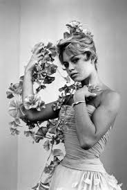 Brigitte bardot's life in photos. Brigitte Bardot Trying On A Dress By Balmain Beruhmte Kunstdrucke Fur Deine Wand
