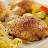 What should the internal temperature of a stuffed chicken breast be?