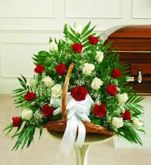 Lovingly designed floral bouquets soften and beautify the funeral home or church environment and provide valued emotional support. Red White Sympathy Fireside Basket Dedham Flower Shop