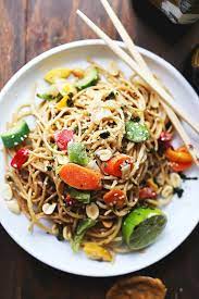 Garlic Peanut Noodles Recipe Delicious Noodles And Stir Fried Vegetables Are Tossed In Garlic Olive Oil And Coated In A Noodle Recipes Recipes Peanut Noodles